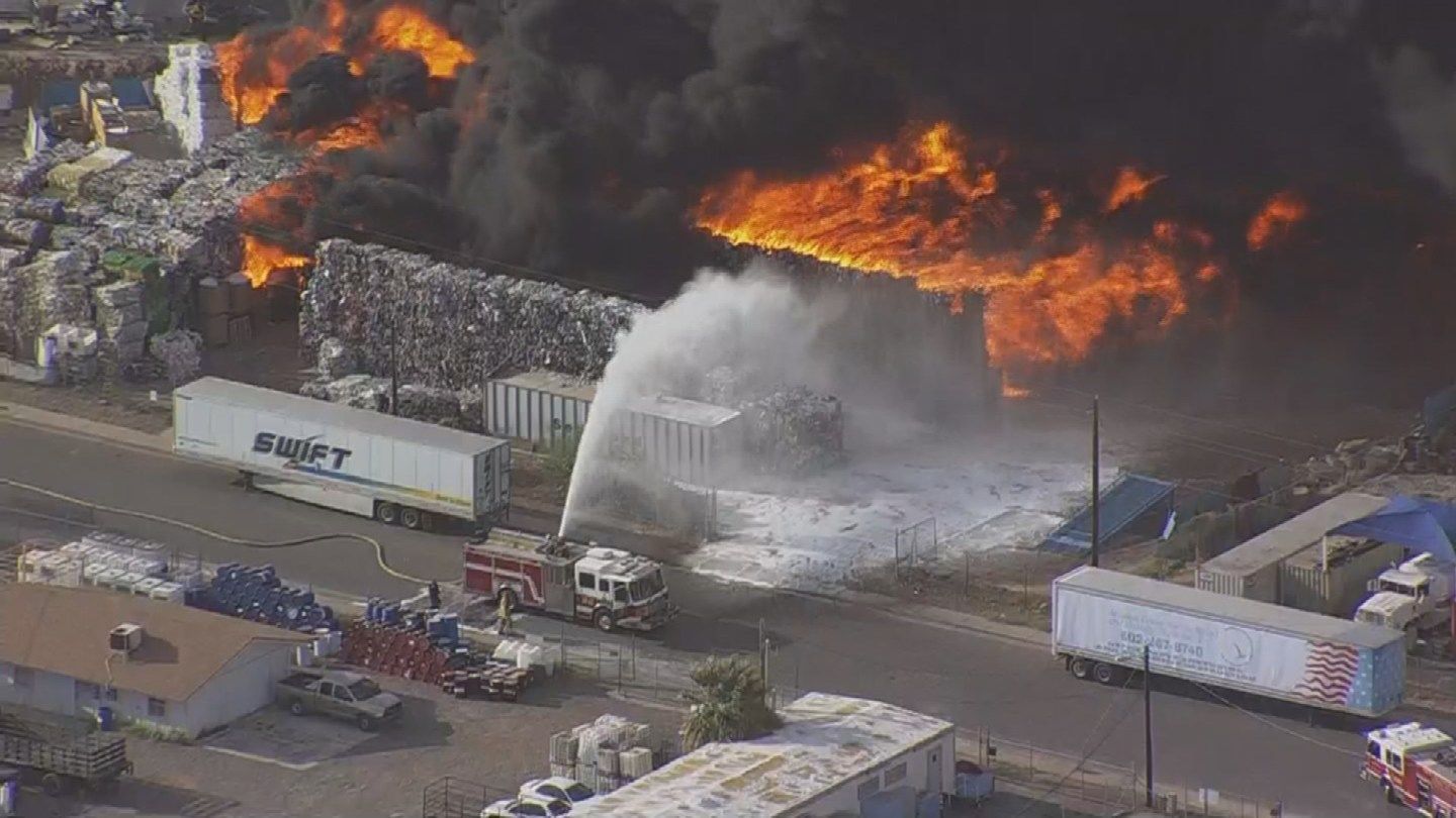Massive fire burning at recycling plant near airport 3TV