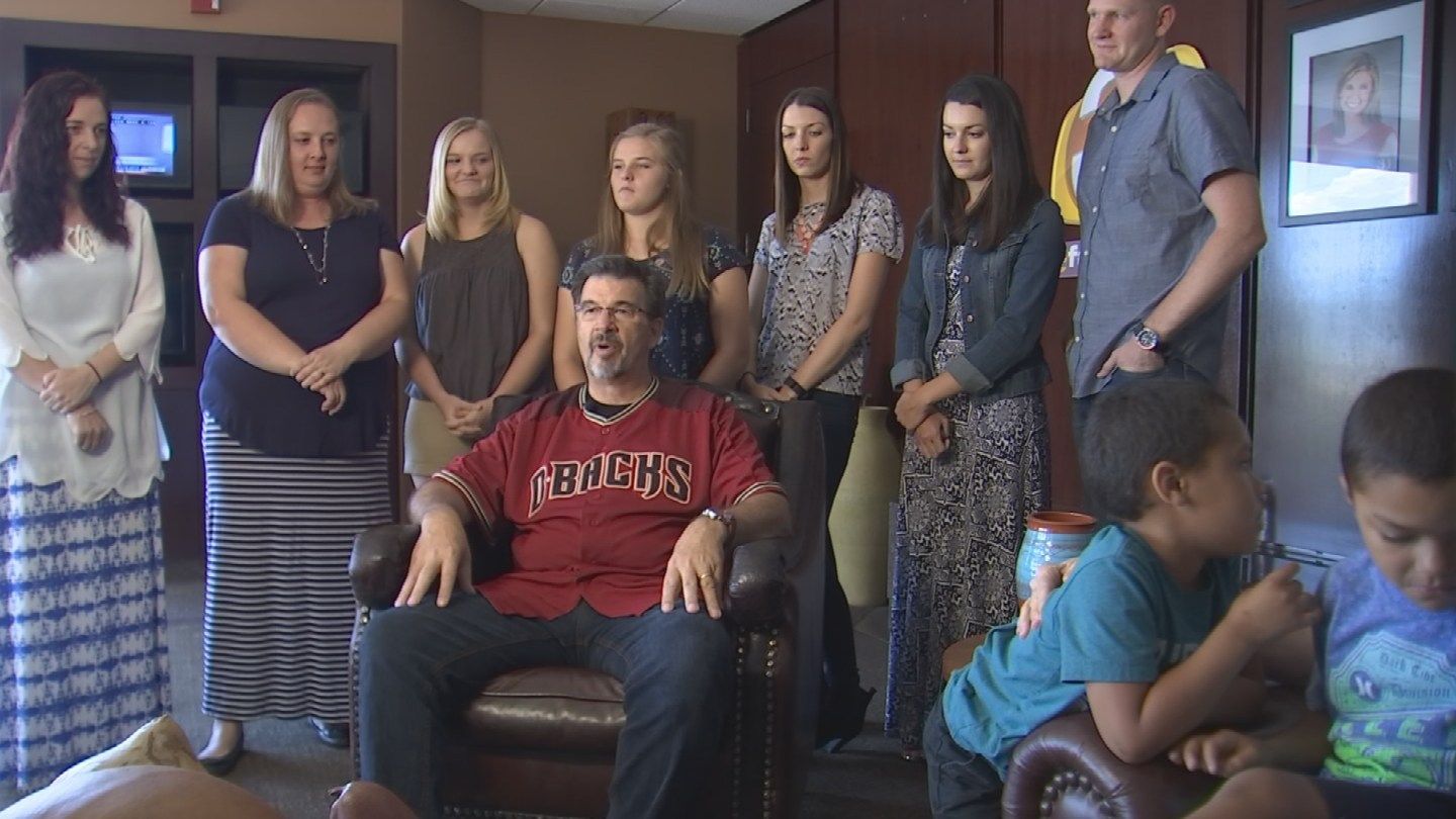 Daniel Perkins has 13 kids and they all watched him throw out the ceremonial first pitch at a D-backs game Sunday. (Source: KPHO/KTVK)