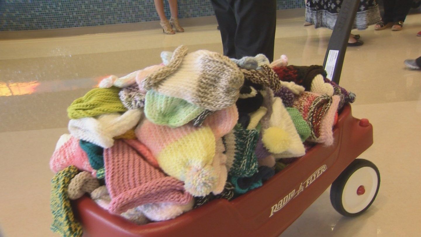Pamela Adams and Eva Espinoza dropped off about 1,700 knitted caps on Wednesday at Phoenix Children's Hospital. (Source: KPHO/KTVK)